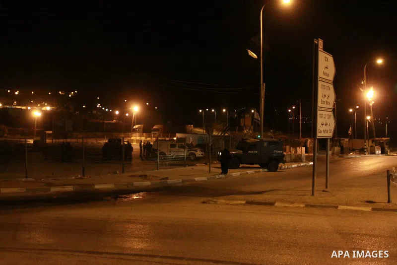 Israeli security forces stand guard at the Zaatara checkpoint after killed a Palestinian man, in the northern West Bank city of Nablus, on June 03, 2014. An Israeli army spokeswoman confirmed the incident, saying that a...