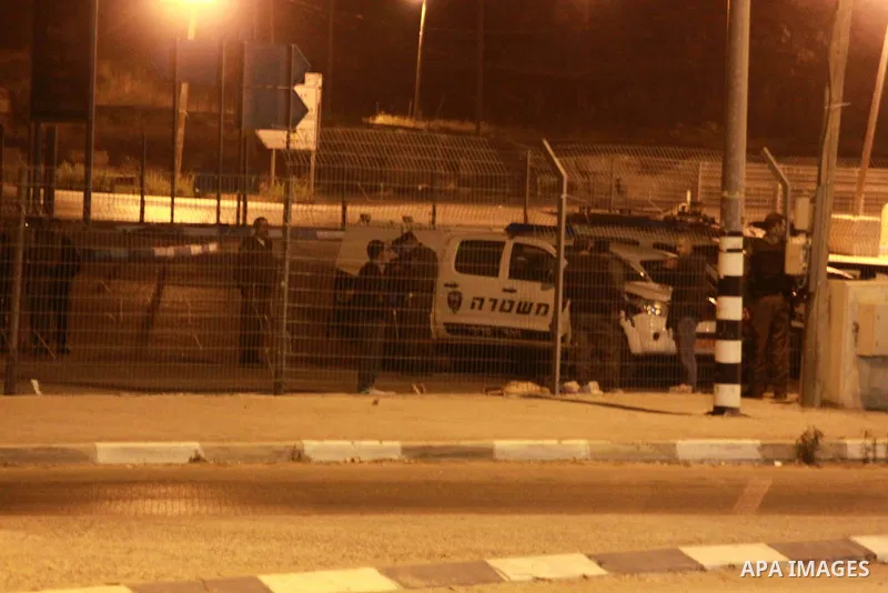 Israeli security forces stand guard at the Zaatara checkpoint after killed a Palestinian man, in the northern West Bank city of Nablus, on June 03, 2014. An Israeli army spokeswoman confirmed the incident, saying that a...