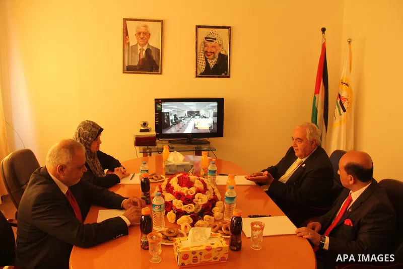 Members of the new Palestinian unity government in Gaza strip attend a meeting in Gaza city, on June 03, 2014. Photo by Atia Darwish