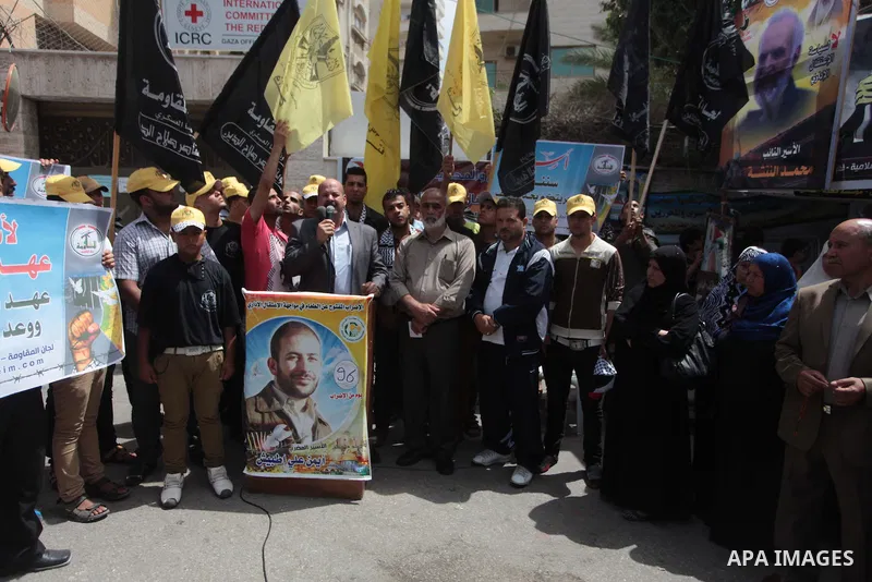 Palestinians take part a protest to solidarity with Palestinian prisoners held in Israeli jails, in front of Red cross office Gaza city, on June 03, 2014. It was about 120 Palestinians imprisoned without trial in Israel...