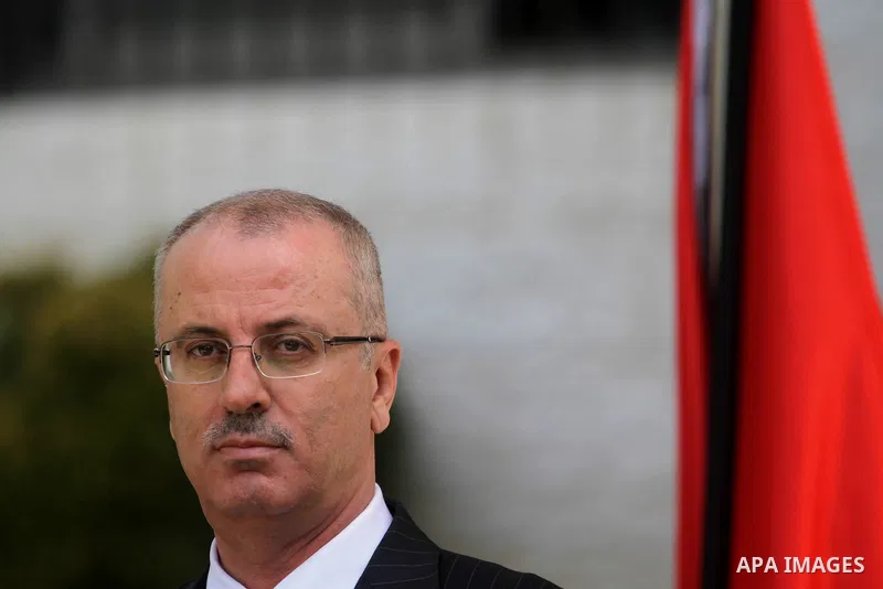 Palestinian Prime Minister Rami Hamdallah talks to media after the first unity government meeting in the West Bank city of Ramallah June 3, 2014. President Barack Obama's administration said on Monday it plans to work wi...