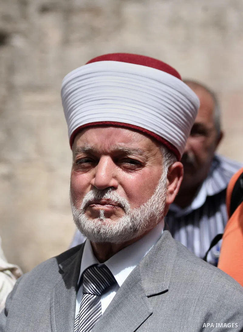 Palestinian members of Supreme Islamic Council hold a press conference, outside the al-Aqsa mosque compound, in Jerusalem's Old City on June 03, 2014. The Supreme Islamic Council represent the Israeli violations against...