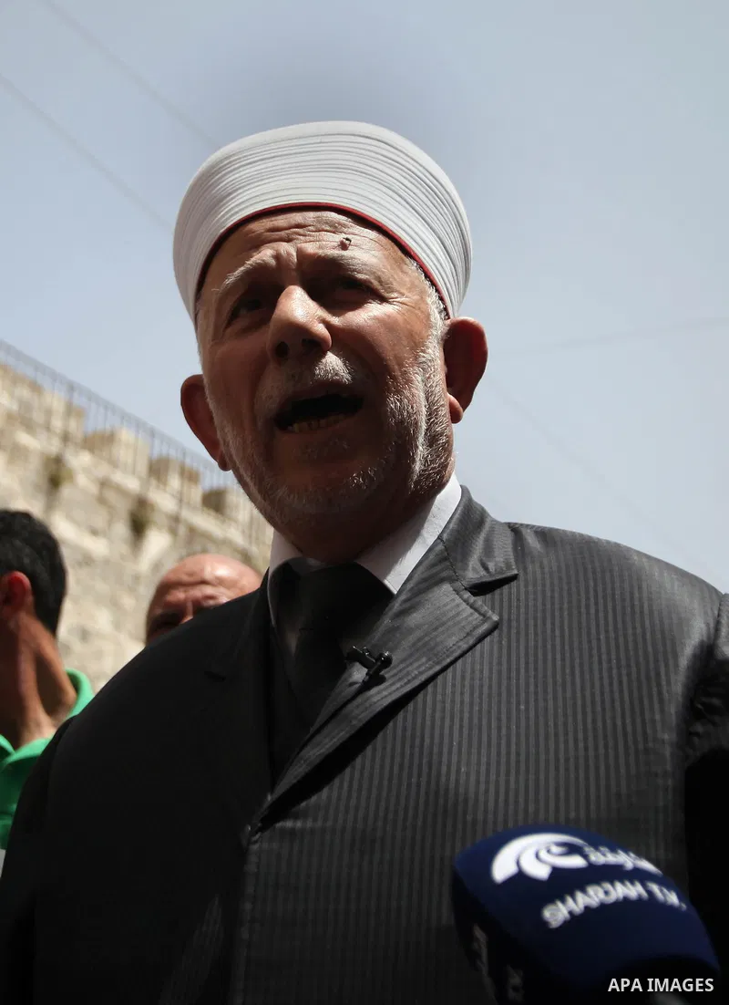 Palestinian members of Supreme Islamic Council hold a press conference, outside the al-Aqsa mosque compound, in Jerusalem's Old City on June 03, 2014. The Supreme Islamic Council represent the Israeli violations against...