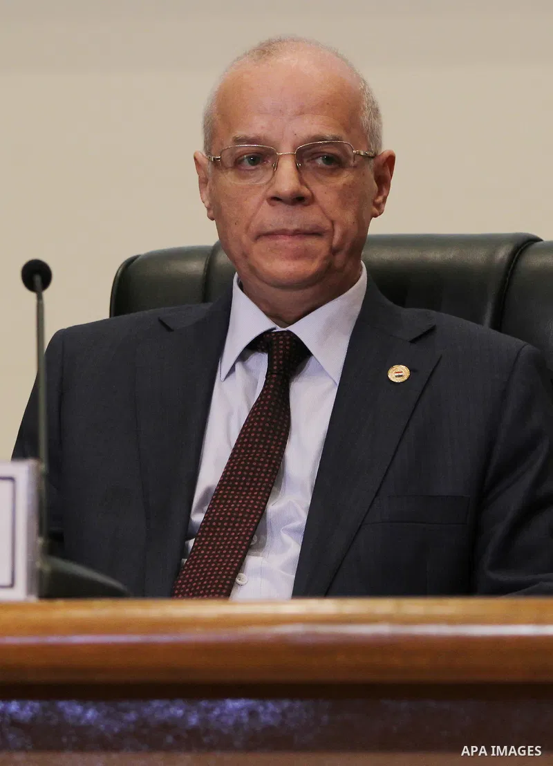 Egyptian judge Anwar Rashad al-Asi, head of the presidential election commission, holds a press conference in the capital Cairo on June 3, 2014, in which he announces that Ex-army chief Abdel Fattah al-Sisi won 96.9 perc...