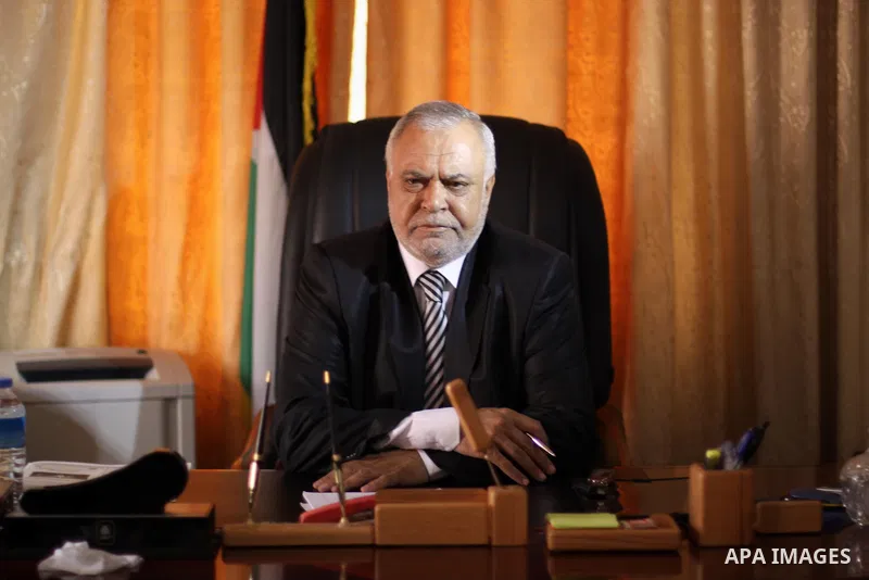 Palestinian Minister of Justice Salim Al Sakkaa attends his first meeting of the new unity government, in Gaza city, on June 04, 2014. The Palestinian national unity government was sworn in on Monday before Palestinian P...