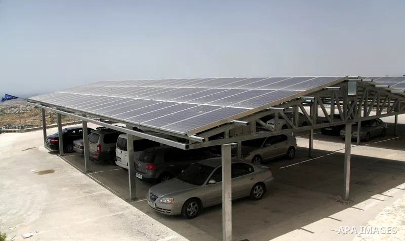 Solar panels are seen on the car park at al-Ahli hospital, in the West Bank City of Hebron, June May 04, 2014. Al-Ahli Hospital Wind Energy Project (AWEP) funded by European Union, is an innovative pilot project that inv...