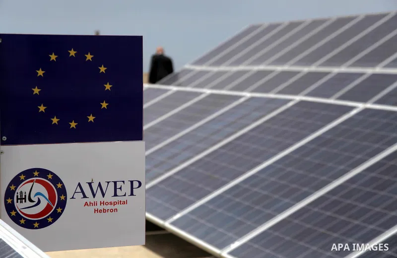 Palestinian engineer Mohammed Tamimi inspects solar panels, at al-Ahli hospital in the West Bank City of Hebron, June May 04, 2014. Al-Ahli Hospital Wind Energy Project (AWEP) funded by European Union, is an innovative p...