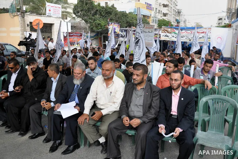 Palestinian supporters of al-Ahrar party take part a protest in the support of the prisoners who are on hunger strike, outside Red Cross Office, in Gaza city June 04, 2014. About 120 Palestinians imprisoned without trial...