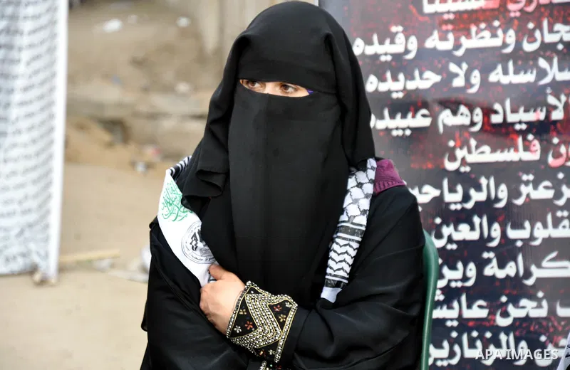 Palestinian supporters of al-Ahrar party take part a protest in the support of the prisoners who are on hunger strike, outside Red Cross Office, in Gaza city June 04, 2014. About 120 Palestinians imprisoned without trial...