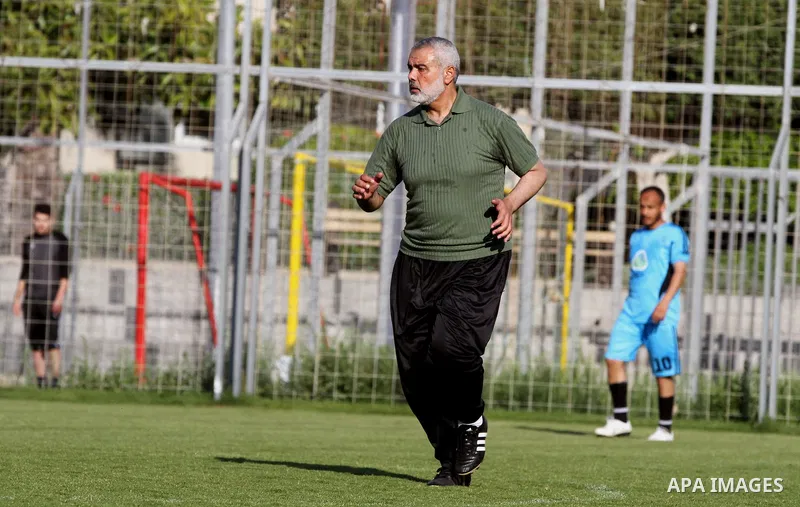 Senior leader of Hamas Ismail Haniyeh participates in football match in solidarity with prisoners on hunger strike held in Israeli jails in Gaza city, on June 7, 2014. Some 120 Palestinians jailed without trial in Israel...