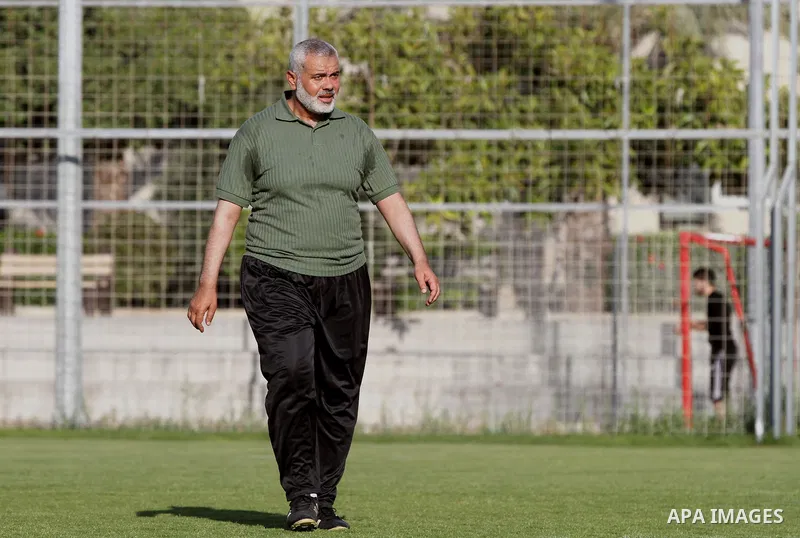 Senior leader of Hamas Ismail Haniyeh participates in football match in solidarity with prisoners on hunger strike held in Israeli jails in Gaza city, on June 7, 2014. Some 120 Palestinians jailed without trial in Israel...