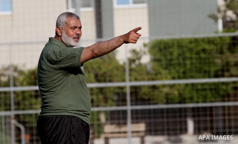 Senior leader of Hamas Ismail Haniyeh participates in football match in solidarity with prisoners on hunger strike held in Israeli jails in Gaza city, on June 7, 2014. Some 120 Palestinians jailed without trial in Israel...
