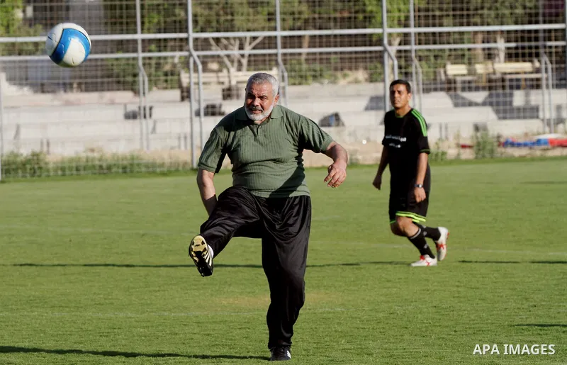 Senior leader of Hamas Ismail Haniyeh participates in football match in solidarity with prisoners on hunger strike held in Israeli jails in Gaza city, on June 7, 2014. Some 120 Palestinians jailed without trial in Israel...