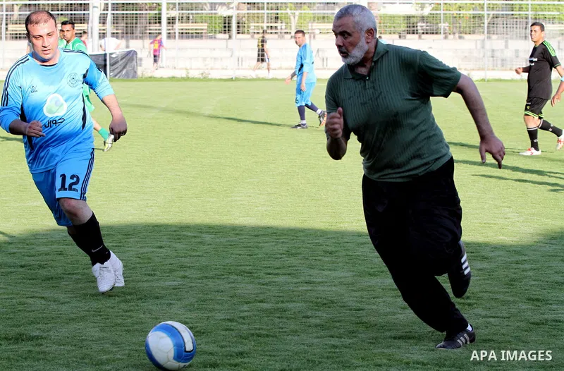Senior leader of Hamas Ismail Haniyeh participates in football match in solidarity with prisoners on hunger strike held in Israeli jails in Gaza city, on June 7, 2014. Some 120 Palestinians jailed without trial in Israel...