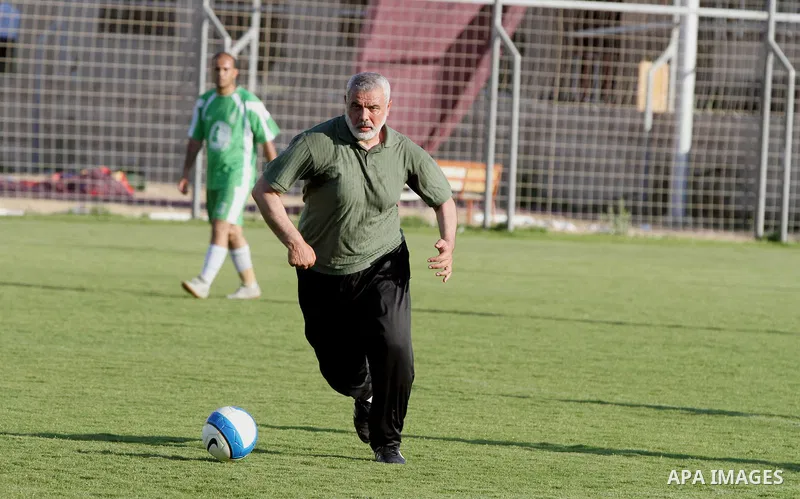 Senior leader of Hamas Ismail Haniyeh participates in football match in solidarity with prisoners on hunger strike held in Israeli jails in Gaza city, on June 7, 2014. Some 120 Palestinians jailed without trial in Israel...