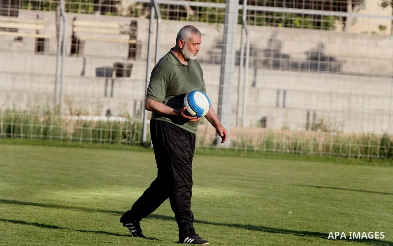 Senior leader of Hamas Ismail Haniyeh participates in football match in solidarity with prisoners on hunger strike held in Israeli jails in Gaza city, on June 7, 2014. Some 120 Palestinians jailed without trial in Israel...