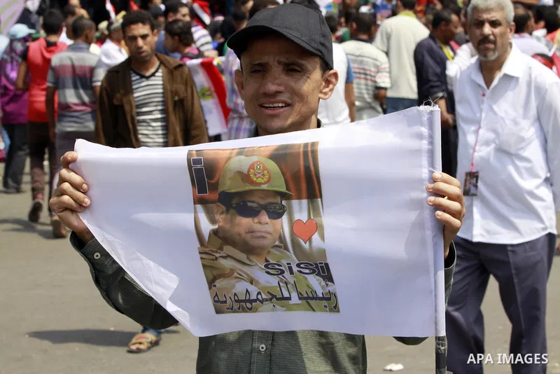 Egyptians celebrate upon the completion of the swearing-in ceremony by President elect Abdel Fattah al-Sissi, in Tahrir square, Cairo, Egypt, 08 June 2014. Former army chief Abdel Fattah al-Sissi was on 08 June, sworn in...