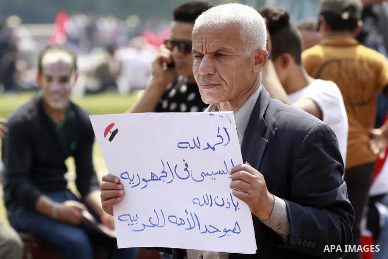 Egyptians celebrate upon the completion of the swearing-in ceremony by President elect Abdel Fattah al-Sissi, in Tahrir square, Cairo, Egypt, 08 June 2014. Former army chief Abdel Fattah al-Sissi was on 08 June, sworn in...