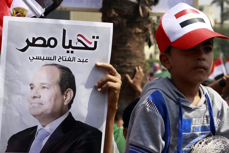Egyptians celebrate upon the completion of the swearing-in ceremony by President elect Abdel Fattah al-Sissi, in Tahrir square, Cairo, Egypt, 08 June 2014. Former army chief Abdel Fattah al-Sissi was on 08 June, sworn in...