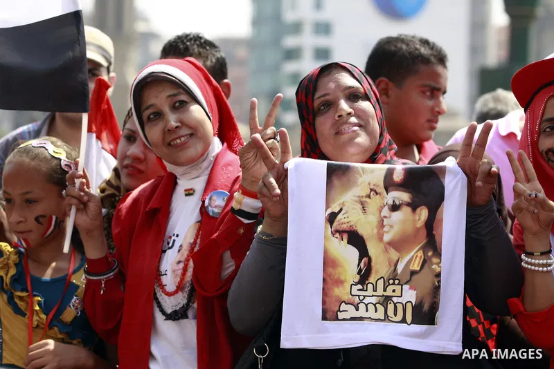 Egyptians celebrate upon the completion of the swearing-in ceremony by President elect Abdel Fattah al-Sissi, in Tahrir square, Cairo, Egypt, 08 June 2014. Former army chief Abdel Fattah al-Sissi was on 08 June, sworn in...
