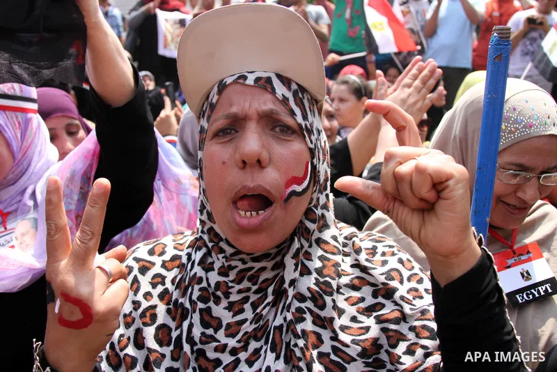 Egyptians celebrate upon the completion of the swearing-in ceremony by President elect Abdel Fattah al-Sissi, in Tahrir square, Cairo, Egypt, 08 June 2014. Former army chief Abdel Fattah al-Sissi was on 08 June, sworn in...