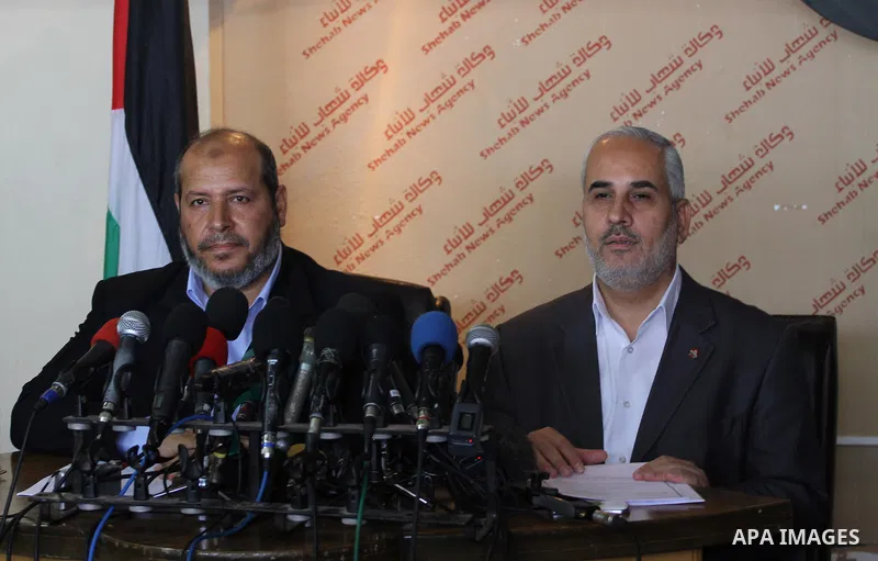 Palestinian Hamas official Khalil al-Hayya speaks during a press conference in Gaza city, on June 09, 2014. Banks in the Gaza Strip remained closed Sunday morning as a financial crisis which began Wednesday evening threa...