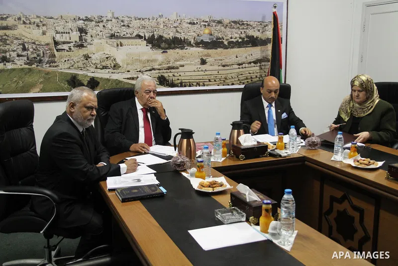 Members of the new Palestinian unity government in Gaza strip attend a meeting in Gaza city, on June 010, 2014. Photo by Alaa Sarraj