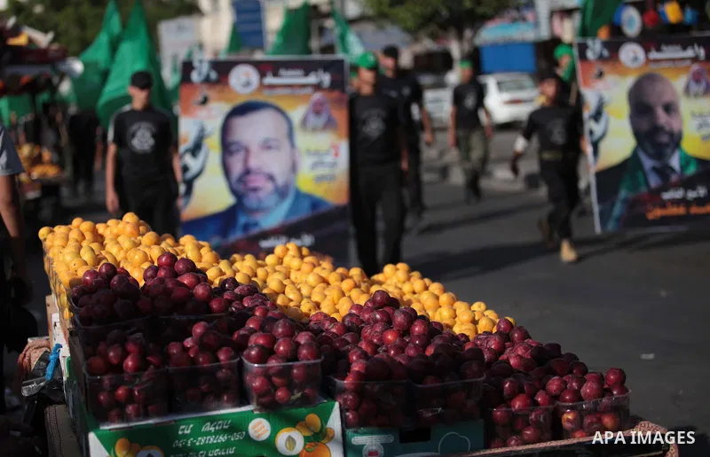 Palestinian children who participate in a summer camp organized by Hamas, march during a rally to show support of 125 Palestinian prisoners detained in Israeli jails and who have been on hunger strike for six weeks, in G...