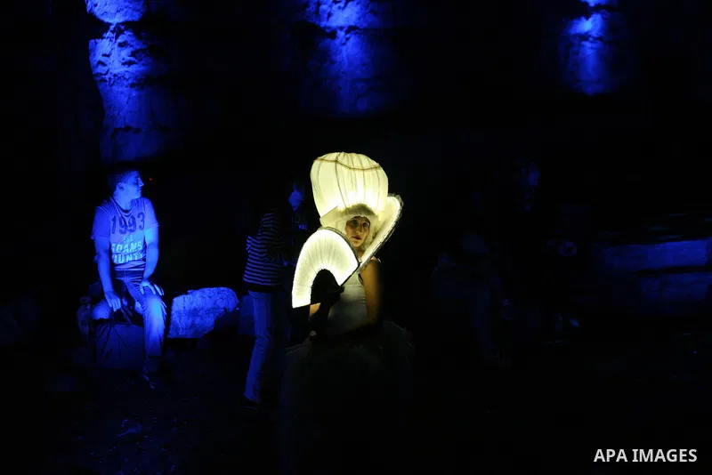 An artist participates in a show during the Jerusalem Lights Festival, in the Old City of Jerusalem, early 12 June 2014. The festival, hosting Israeli and international artists and creators, opened on late evening 11 Jun...