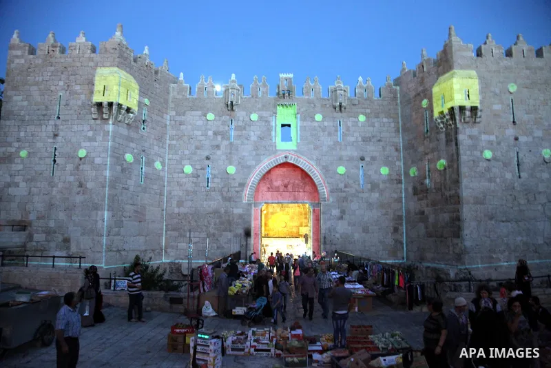 A light projection show is seen on the Damascus Gate during the Jerusalem Lights Festival, in the Old City of Jerusalem, early 12 June 2014. The festival, hosting Israeli and international artists and creators, opened on...