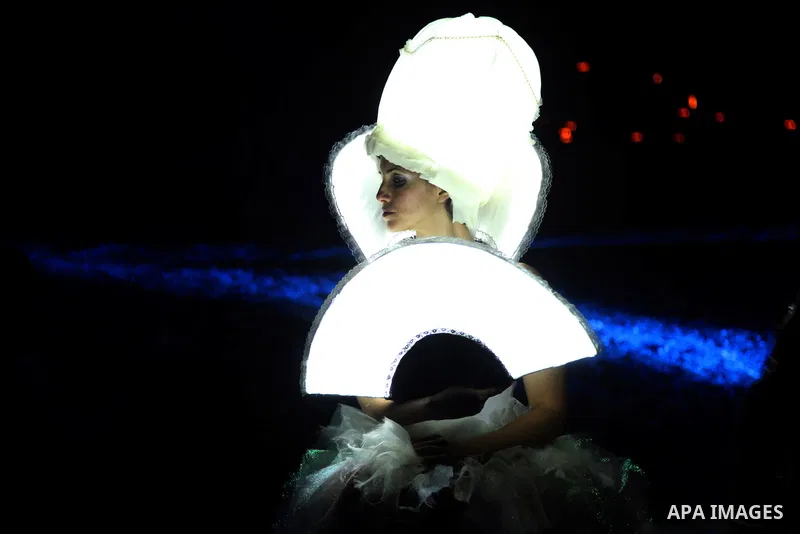 An artist participates in a show during the Jerusalem Lights Festival, in the Old City of Jerusalem, early 12 June 2014. The festival, hosting Israeli and international artists and creators, opened on late evening 11 Jun...