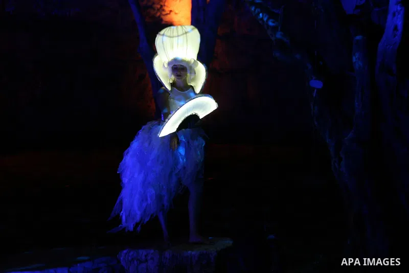 An artist participates in a show during the Jerusalem Lights Festival, in the Old City of Jerusalem, early 12 June 2014. The festival, hosting Israeli and international artists and creators, opened on late evening 11 Jun...