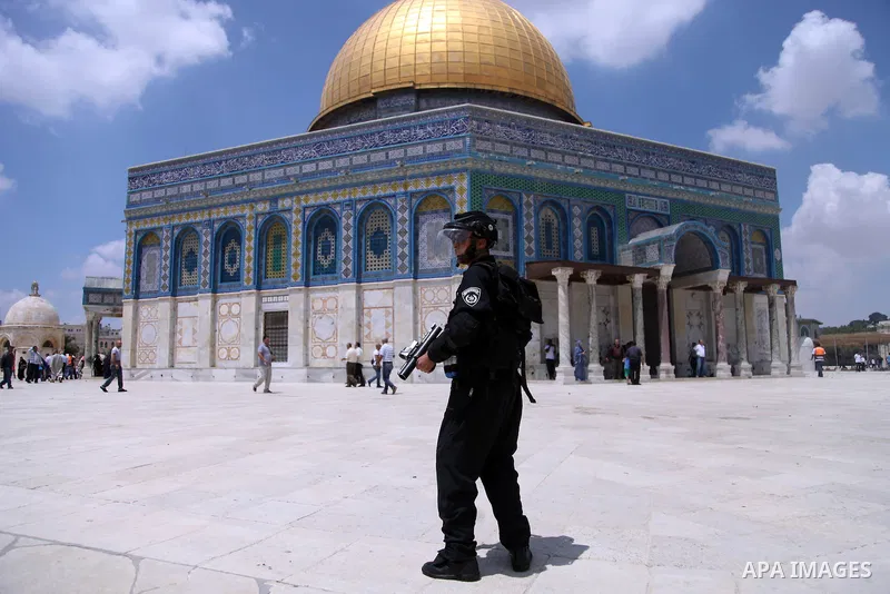 Israeli riot police take position during clashes with Palestinian youths following Friday prayers at the al-Aqsa mosque compound in Jerusalem's Old City on June 13, 2014. Photo by Saeed Qaq