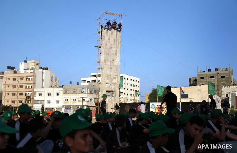 Palestinian youths take part in a military-style exercise at a summer camp organized by the Hamas movement in Gaza City June 18, 2014. Hamas stages dozens of military-style summer camps for young Palestinians in the Gaza...