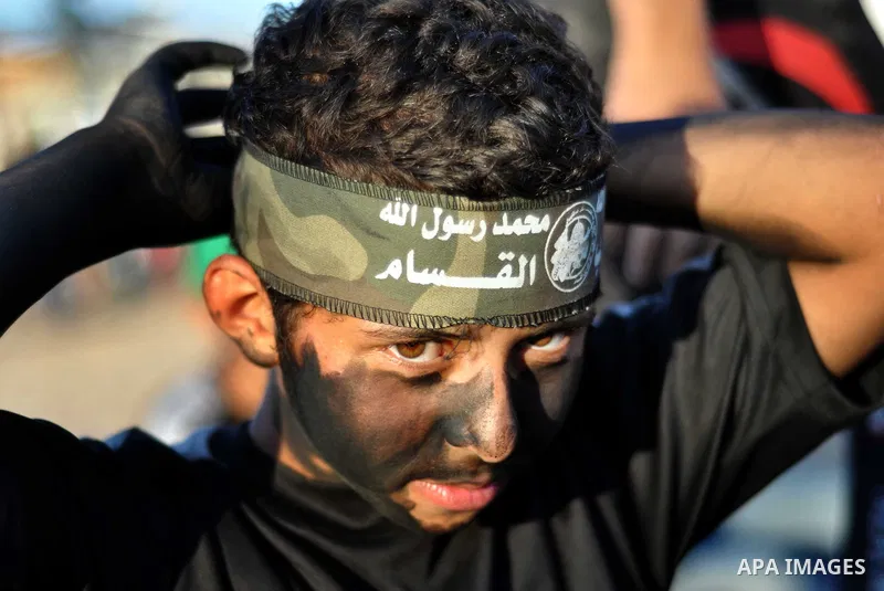 Palestinian youths take part in a military-style exercise at a summer camp organized by the Hamas movement in Gaza City June 18, 2014. Hamas stages dozens of military-style summer camps for young Palestinians in the Gaza...