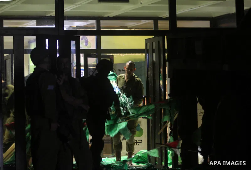 Israeli soldiers patrol at Birzeit University, on the outskirts of the city of Ramallah in the West Bank during an operation on June 19, 2014 as Israeli forces broadened the search for three teenagers believed kidnapped...