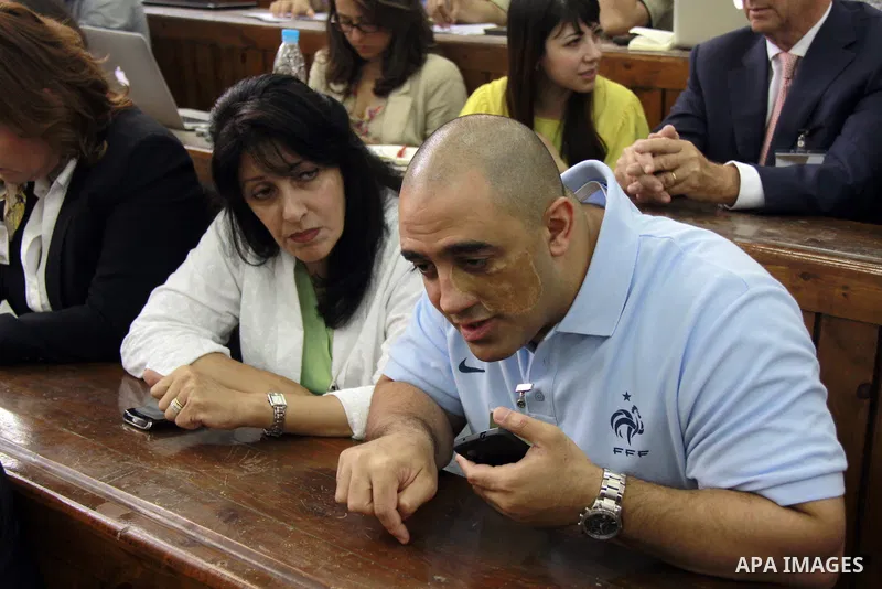 Adel Fahmy, brother of Mohamed Fahmy, Wafa Bassiouni, mother of Mohamed Fahmy, attend the sentencing session at a courtroom in Cairo, Egypt, 23 June 2014. Three Al Jazeera journalists were jailed for seven years in Egypt...