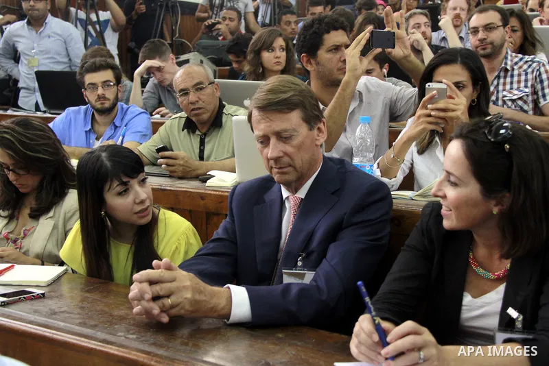 The British ambassador James Watt, attends the sentencing session at a courtroom in Cairo, Egypt, 23 June 2014. Three Al Jazeera journalists were jailed for seven years in Egypt on Monday after a court convicted them of...