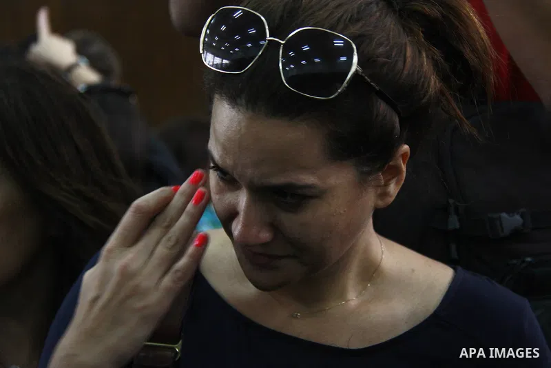 Relatives of Al Jazeera journalists attend the sentencing session at a courtroom in Cairo, Egypt, 23 June 2014. Three Al Jazeera journalists were jailed for seven years in Egypt on Monday after a court convicted them of...
