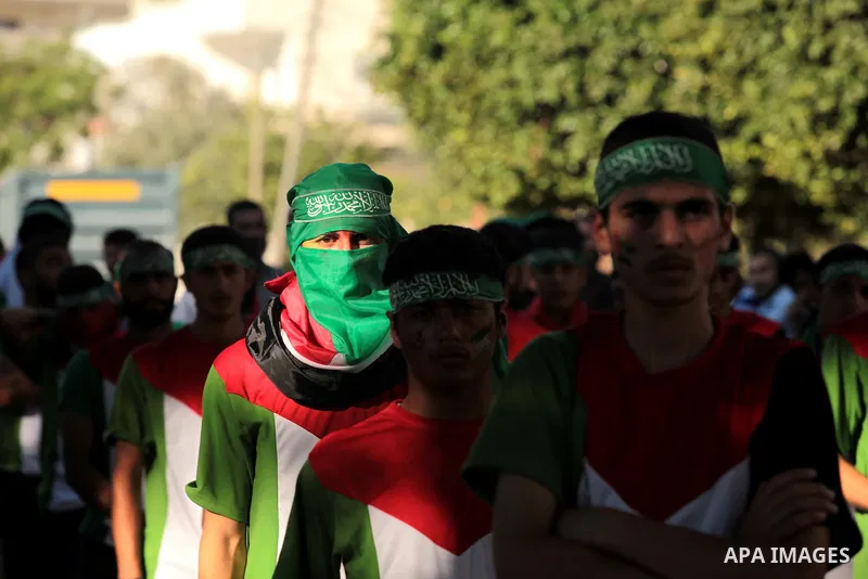 Palestinian children take part in a rally in solidarity with the hunger-striking Palestinian prisoners held by Israel, in Jabalia refugee camp in the northern Gaza Strip, June 24, 2014. Nearly 300 Palestinian prisoners h...