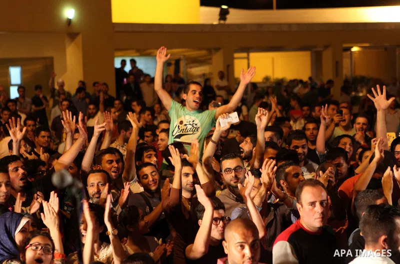 Palestinians take part in a concert in the courtyard of the French Cultural Center in Gaza City, on June 24, 2014. Photo by Ezz Zanoun