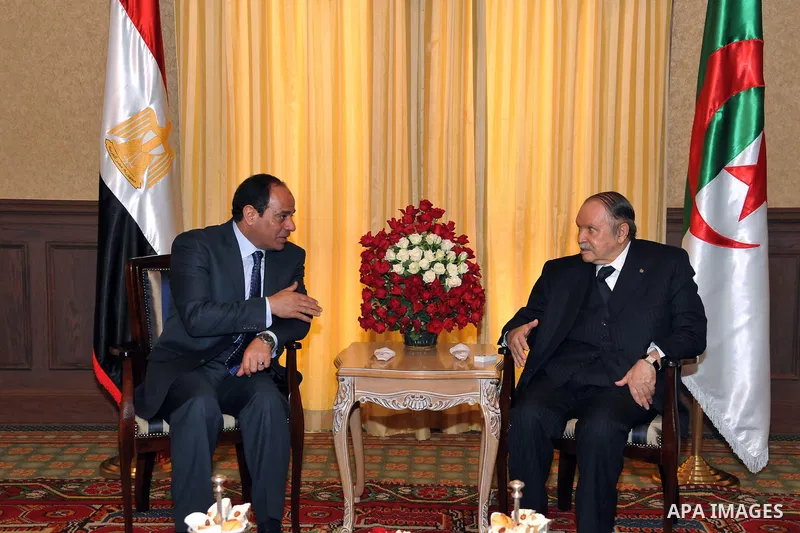 A handout photo made available by the Egyptian Presidency shows Egyptian President Abdel Fattah al-Sissi (L) meeting with Algerian President Abdelaziz Bouteflika (R) in Algiers, Algeria, 25 June 2014. Al-Sissi arrived in...