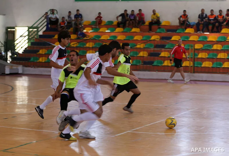 Palestinian football players participate in a match the during the championship of ''Gaza World Cup", in an event against the Israeli blockade on Gaza Strip, in Gaza City on June 27, 2014. Palestinians share a billion or...