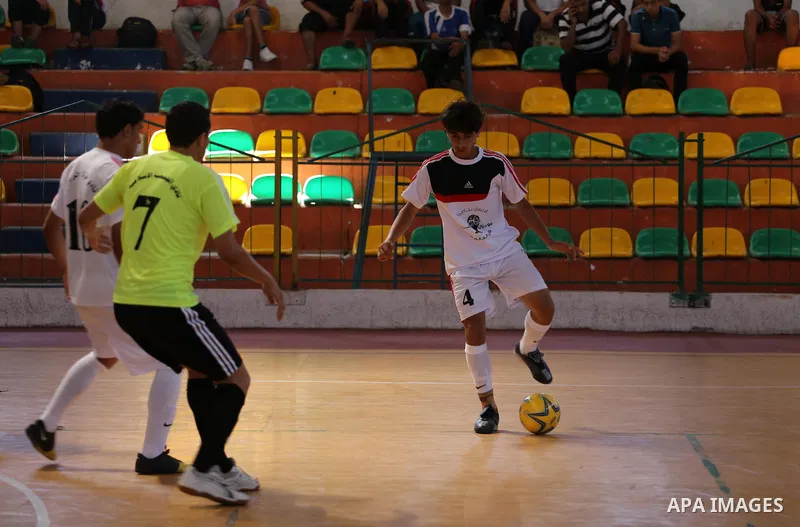 Palestinian football players participate in a match the during the championship of ''Gaza World Cup", in an event against the Israeli blockade on Gaza Strip, in Gaza City on June 27, 2014. Palestinians share a billion or...