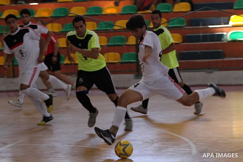 Palestinian football players participate in a match the during the championship of ''Gaza World Cup", in an event against the Israeli blockade on Gaza Strip, in Gaza City on June 27, 2014. Palestinians share a billion or...
