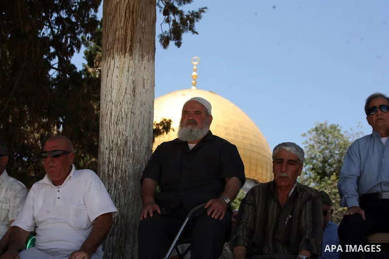 Palestinian Muslim worshipers take part in Friday prayers at the Al-Aqsa mosque compound, Islam's third holiest site, in the Old City of Jerusalem on June 27, 2014. Photo by Saeed Qaq