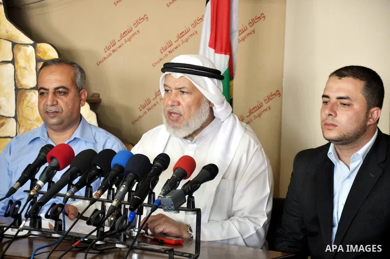 Palestinian head of the Parliamentary Committee of the Legislative Council, Marwan Abu Ras speaks during a press conference in Gaza City, on June 28, 2014. Photo by Mohammed Talatene
