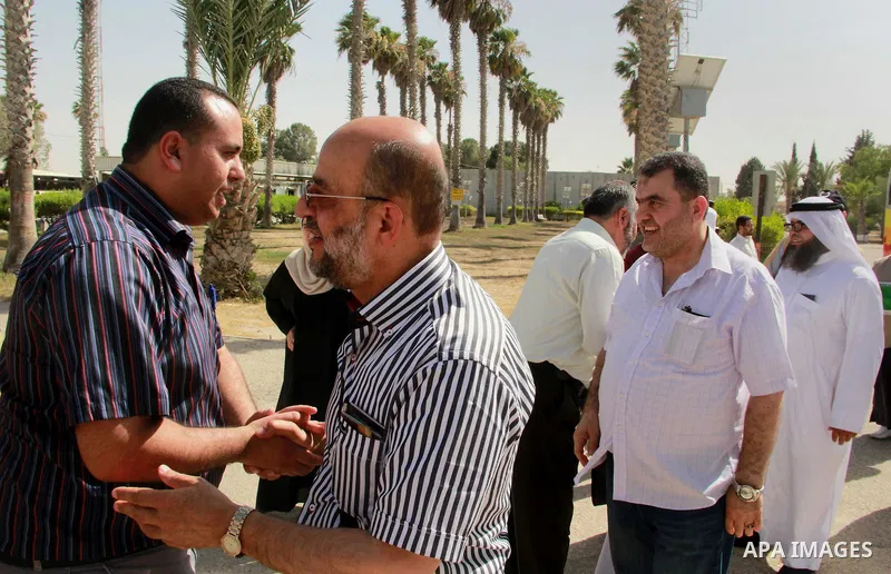 Members of the aid convoy of "Miles of Smiles 28" convoy at Rafah crossing border in southern Gaza Strip, June 29, 2014. Photo by Eyad Al Baba