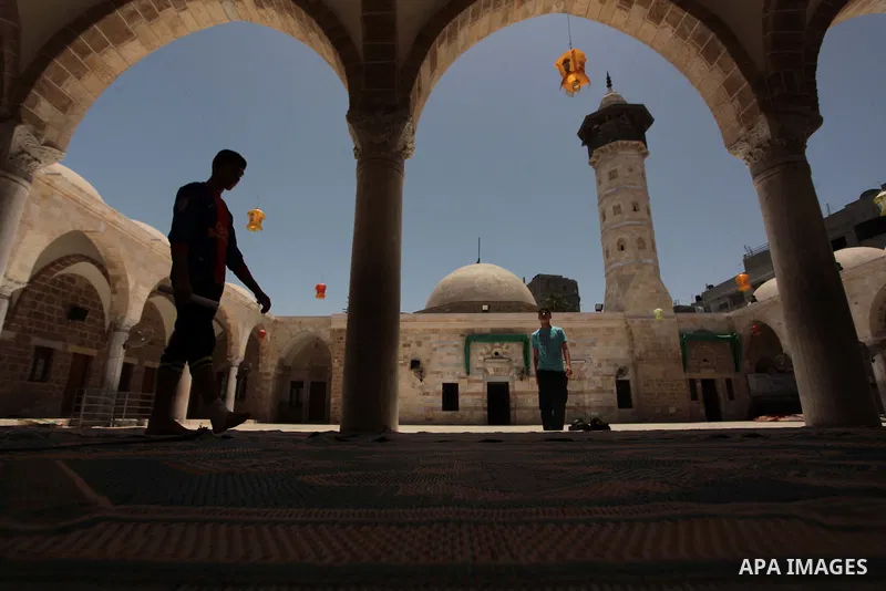 Palestinian muslims pray at mosque during the Muslims fasting month of Ramadan in Gaza city, on June 30, 2014. Muslims around the world refrain from eating, drinking and sexual intercourse from dawn till dusk during Rama...