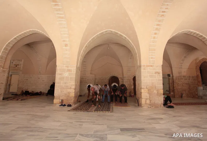 Palestinian muslims pray at mosque during the Muslims fasting month of Ramadan in Gaza city, on June 30, 2014. Muslims around the world refrain from eating, drinking and sexual intercourse from dawn till dusk during Rama...